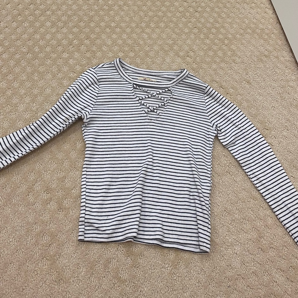 full sleeve night out top. black and white stripes. cross neck